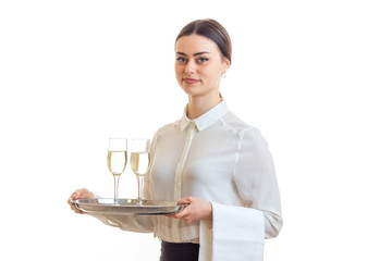 beautiful skinny waitress with glasses of wine