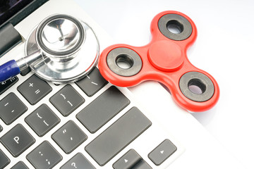 Fidget spinner with autistic therapy concept