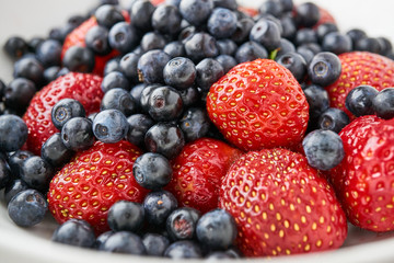 Assorted blueberries and strawberries