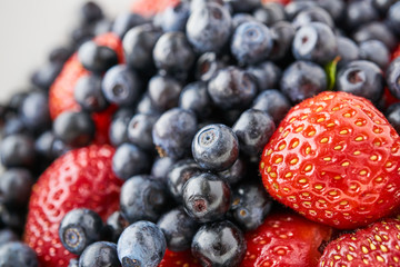 Assorted blueberries and strawberries