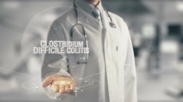Doctor holding in hand Clostridium Difficile Colitis