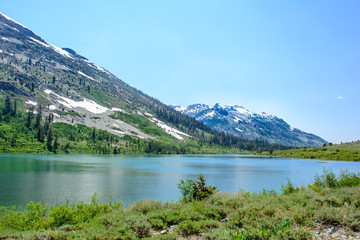 Glacier Mountain with Lake in the Summer with green