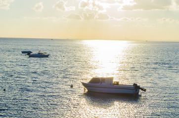 Boat at sunset beach
