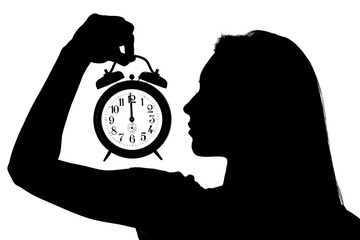 Woman Holding An Alarm Clock