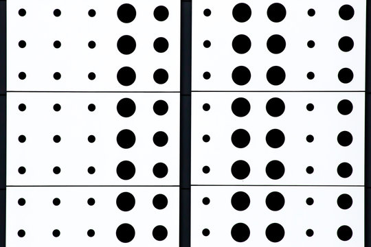 black and white polka dot pattern background