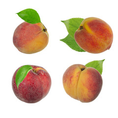 set of peaches with leaves isolated