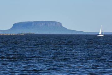 Poster Lake Superior at Thunder Bay with a butte in the background. © johnsroad7