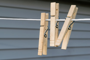 Clothes Pins Made of Wood on a Line