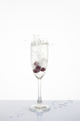 Grapes in a glass isolated, Soda splashes in the glass isolated.
