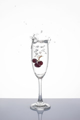 Grapes in a glass isolated, Soda splashes in the glass isolated.