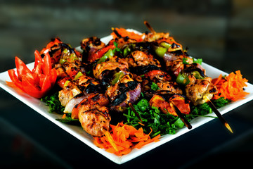 Meals of chicks, meat, shish tawook, rice and appetizers , grilled