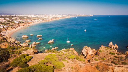 Aerial view of cliffs and beach Praia in Portimao, Algarve region, Portugal