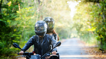 couple biker riding motorcycle
