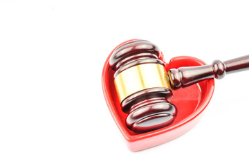 Gavel and red love mug.