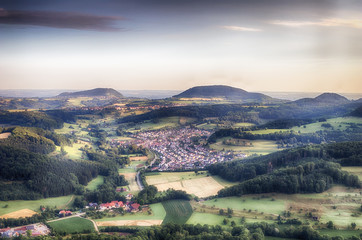Bird's-eye view of Winzingen - Donzdorf, Baden-Württemberg, Germany, with two of the Drei Kaiserberge (three emperor-mountains) in the background.