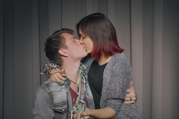 Happy couple in a photo booth