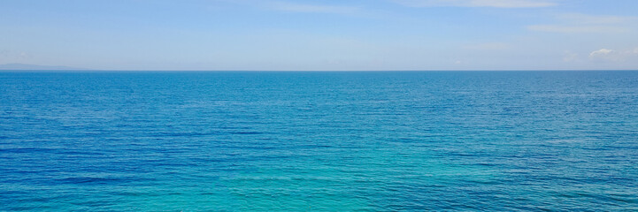 Fototapeta premium Photo of tropical sea. Summer travel and vacation concept - panoramic banner.