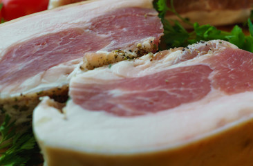 Pork pieces are salted in the traditional way.