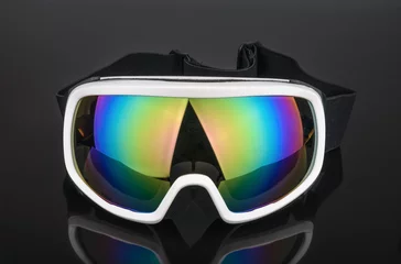 Wandaufkleber ski goggles on black background © azure