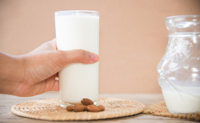 milk glass on wooden table. Healthy eating concept