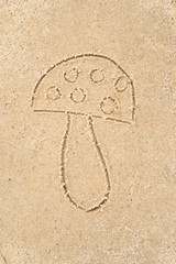 toadstool drawing in sand