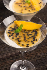 Panna cotta dessert with passion fruit and mint