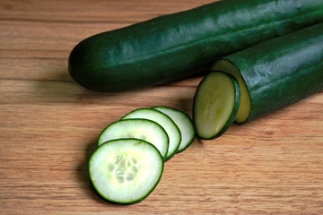 Closeup of cucumbers on a wooden table
