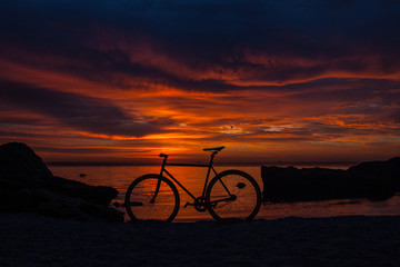 Naklejka na ściany i meble Bicycle at dawn
