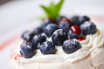 meringue dessert with fresh berries