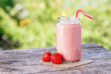 strawberry milkshake in jar