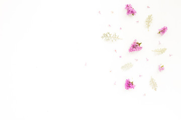 Flowers background. Lilac and grey flowers on white background. Flat lay, top view