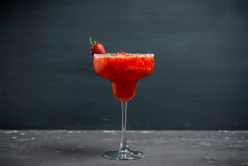 Cocktail strawberry margarita on the wooden background. Selective focus. - obrazy, fototapety, plakaty