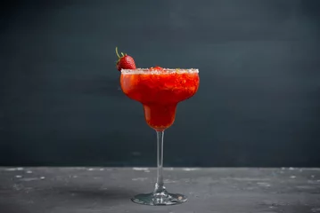 Rolgordijnen Cocktail strawberry margarita on the wooden background. Selective focus. © maxandrew