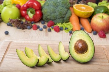 Avocado on wood table ,Healthy food concept