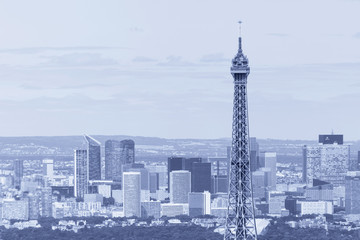 Obraz premium close up of top part of Eiffel tower against La Defense district