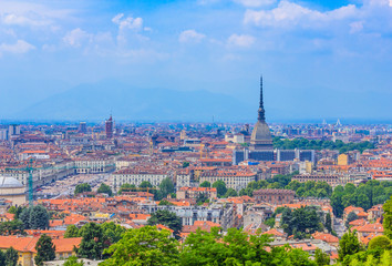 Fototapeta na wymiar a magnificent view of Turin with the Mole Antonelliana,the architectural symbol of Turin/ The Mole is 167 meters and a half high and is the tallest building in Europe built in 1863. 
