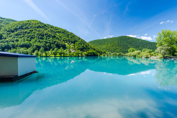 Julian Alps reflection in MOst na Soci lake,Slovenia