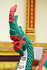 Fototapeta na wymiar Naga ladder sculpture in Lao temple, Laos
