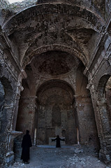 Monks inside an abandoned church