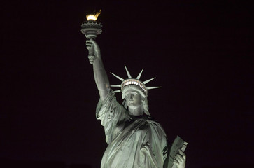 Statue of Liberty at night. - 163635121