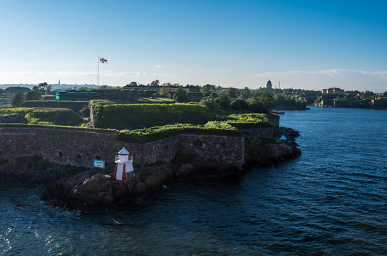 Suomenlinna castle on the island near Helsinki side of the stone fortress and the lighthouse are visible 