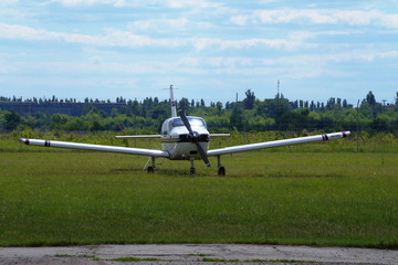 Ultralight airplane on the airfield.