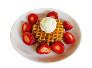 Waffles with strawberries and ice cream on white plate isolated on white background