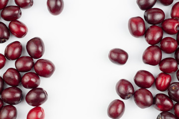 Many red fresh cherries on white background