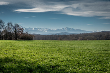 Fototapeta na wymiar Mountains behind fields