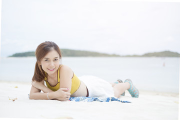 Portrait Asian Caucasian woman on The beach.