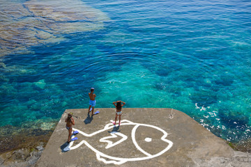 Kids swimming on the Greek Islands