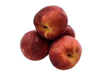 A few ripe peaches isolated on a white background