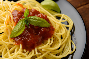 Spaghetti with tomato sauce and their ingredients around .Adjustment size for banner, cover and header.
