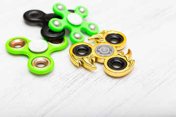 Hand spinners or fidgeting spinners. Many types and shapes of spinners